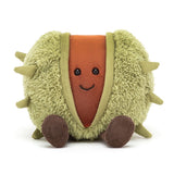 A plush toy resembling a conker, with a soft green shell and a brown body, sitting upright with a happy expression.