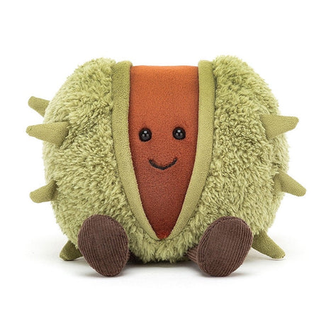 A plush toy resembling a conker, with a soft green shell and a brown body, sitting upright with a happy expression.