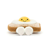 Jellycat Plush toy resembling a fried egg with a smiling face on a white background
