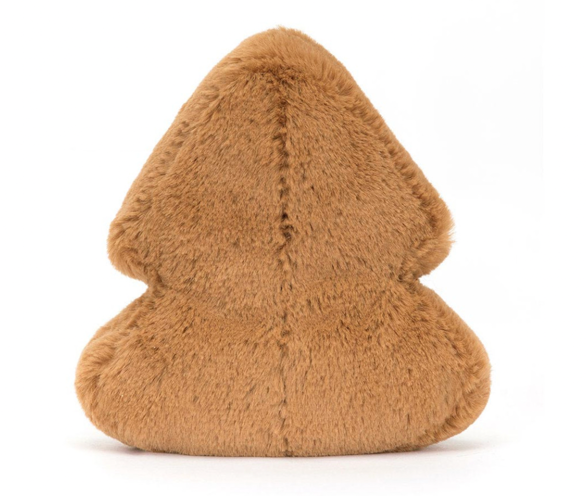 A plush toy resembling a Christmas tree cookie with brown fur