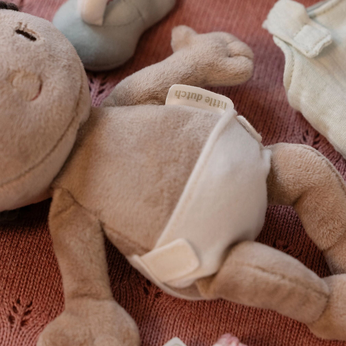 Close up of Little Dutch Baby Doll Evi body showing removable nappy with Little Dutch label