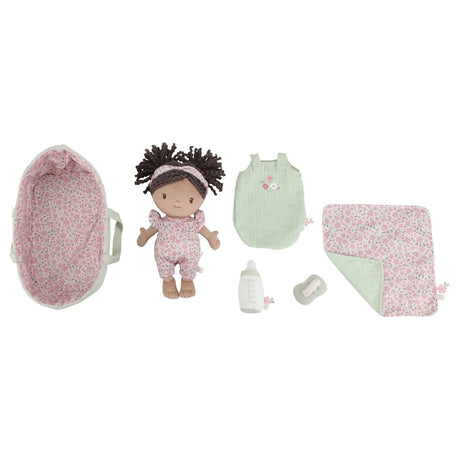 Little Dutch Baby Doll Evi flat lay showing doll, sage green basket, sleeping bag, floral blanket, bottle and dummy