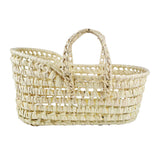 A beige wicker  woven bassinet or moses basket with two side handles, suitable for carrying dolls or soft toys.