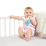 Baby playing with Peter Rabbit soft plush ring rattle