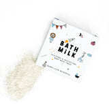 Baby bath milk packaging with white powder on a white background