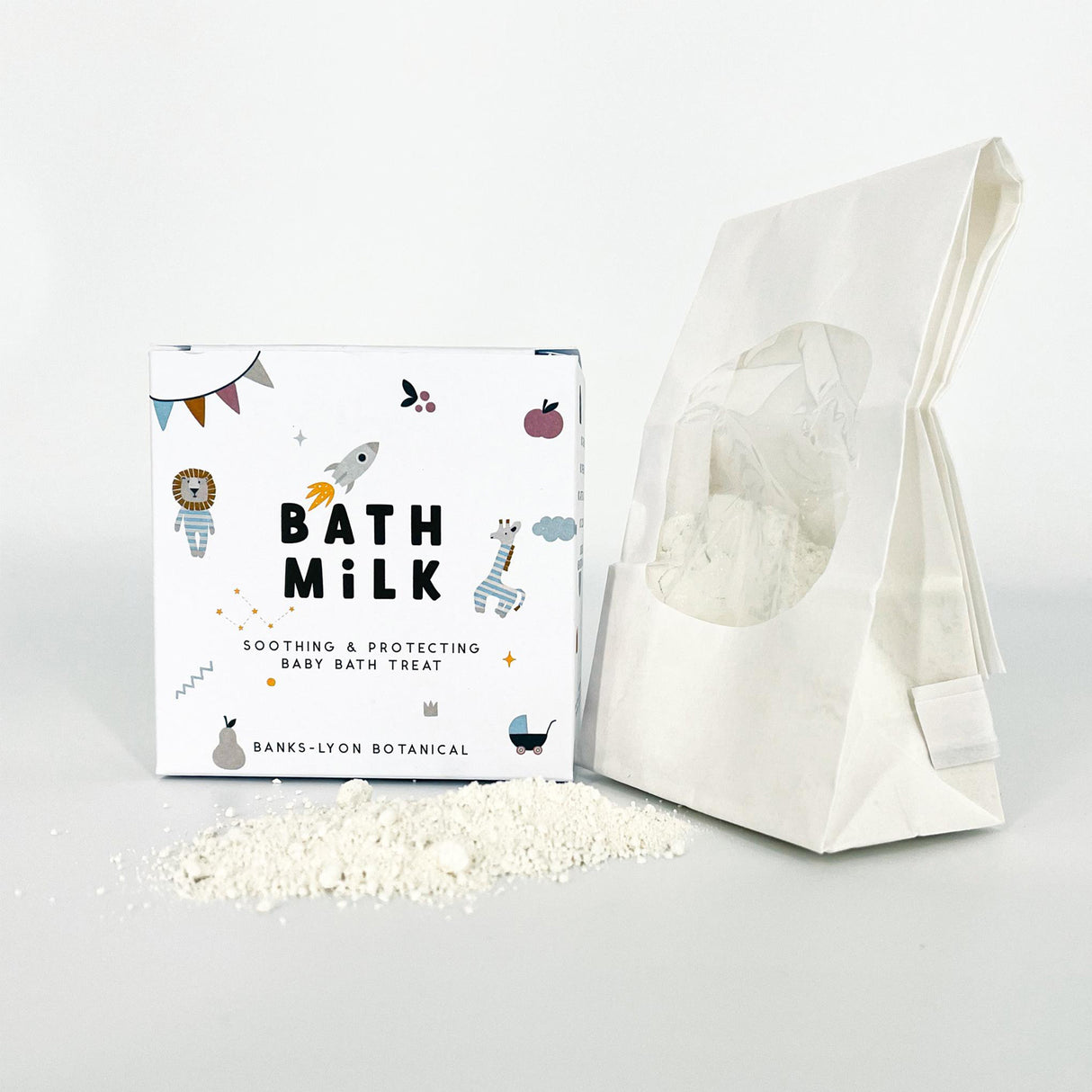 Bath milk packaging with a white bag of bath milk on a light gray background