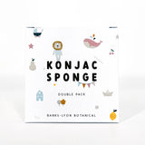 Konjac sponge packaging with cartoon illustrations on a white background