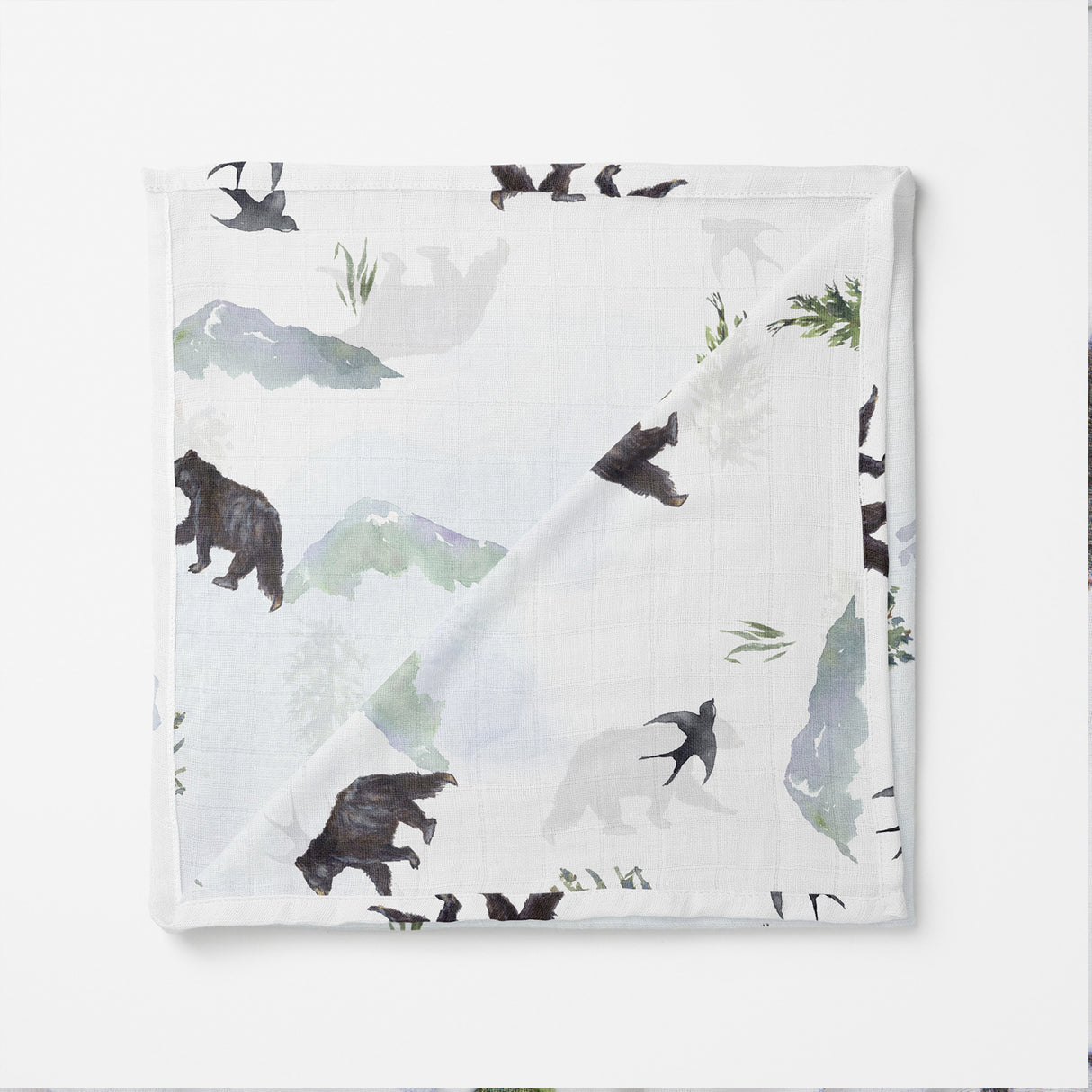 Banks Lyon Botanical Organic Muslin Swaddle Blanket with bear and mountain print