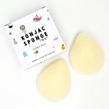 Konjac sponges with packaging on a white background