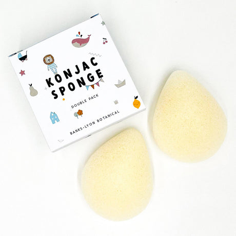 Konjac sponges with packaging on a white background