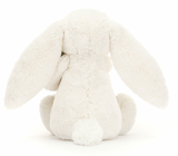 White bunny soft toy from behind