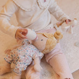 Child playing with the soft baby doll Julia set
