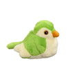 Plush toy bird with green body and cream belly on a white background