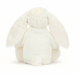 white Soft bunny toy wearing a knitted white jumper