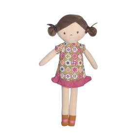 Toy doll with a floral dress on a white background