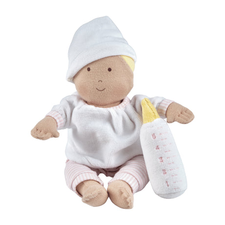 Soft baby doll with white an pink outfit with a bottle