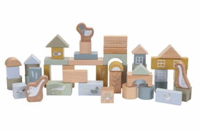 A collection of wooden building blocks in various shapes and sizes, decorated with characters from a children's storybook. The blocks are in shades of blue, beige, and different colors representing different characters' outfits and accessories.