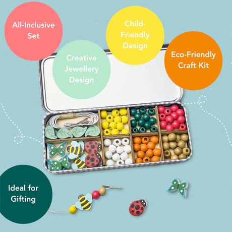 Cotton Twist open tin box with compartments containing colourful beads and decorative items on a blue background