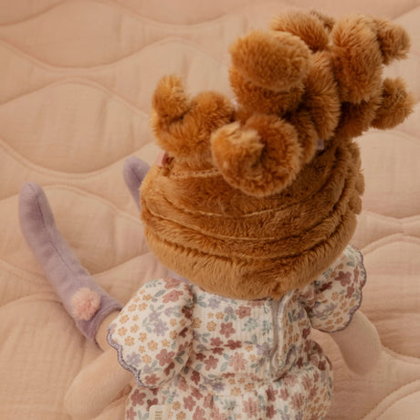 Little Dutch Cuddle Doll Ava with soft wavy hair detail up in a messy bun
