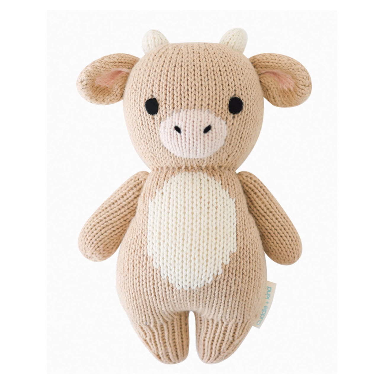 Hand knitted toy Jersey cow on a white background