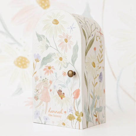 Decorative box with floral design and 'hannah the bunny' text on a white background
