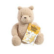Official Disney Winnie the Pooh 100 soft plush bear sitting with Rainbow Designs gift tag on white background