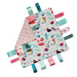 A square baby comforter featuring a colourful tropical print of flamingos, toucans, and foliage on a white with a pink minky dot reverse side and colourful matching satin ribbon tabs.