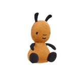A small flop knitted bean toy with 
black antennae, black arms, and black feet, from the bing tv show