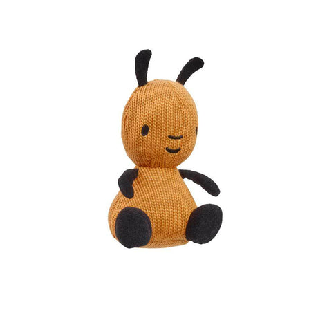 A small flop knitted bean toy with 
black antennae, black arms, and black feet, from the bing tv show