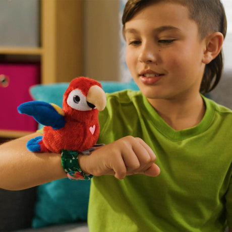 Child wearing a red parrot-shaped toy on a wristband