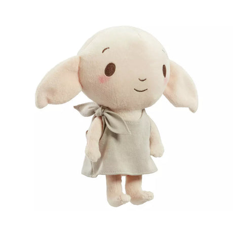 Plush soft toy Dobby character from Harry Potter. Big ears and a smiling face wearing his pillowcase on a white background
