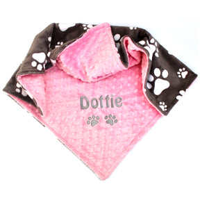 Pink pet blanket with paw print backing fabric and personalised name embroidery 
