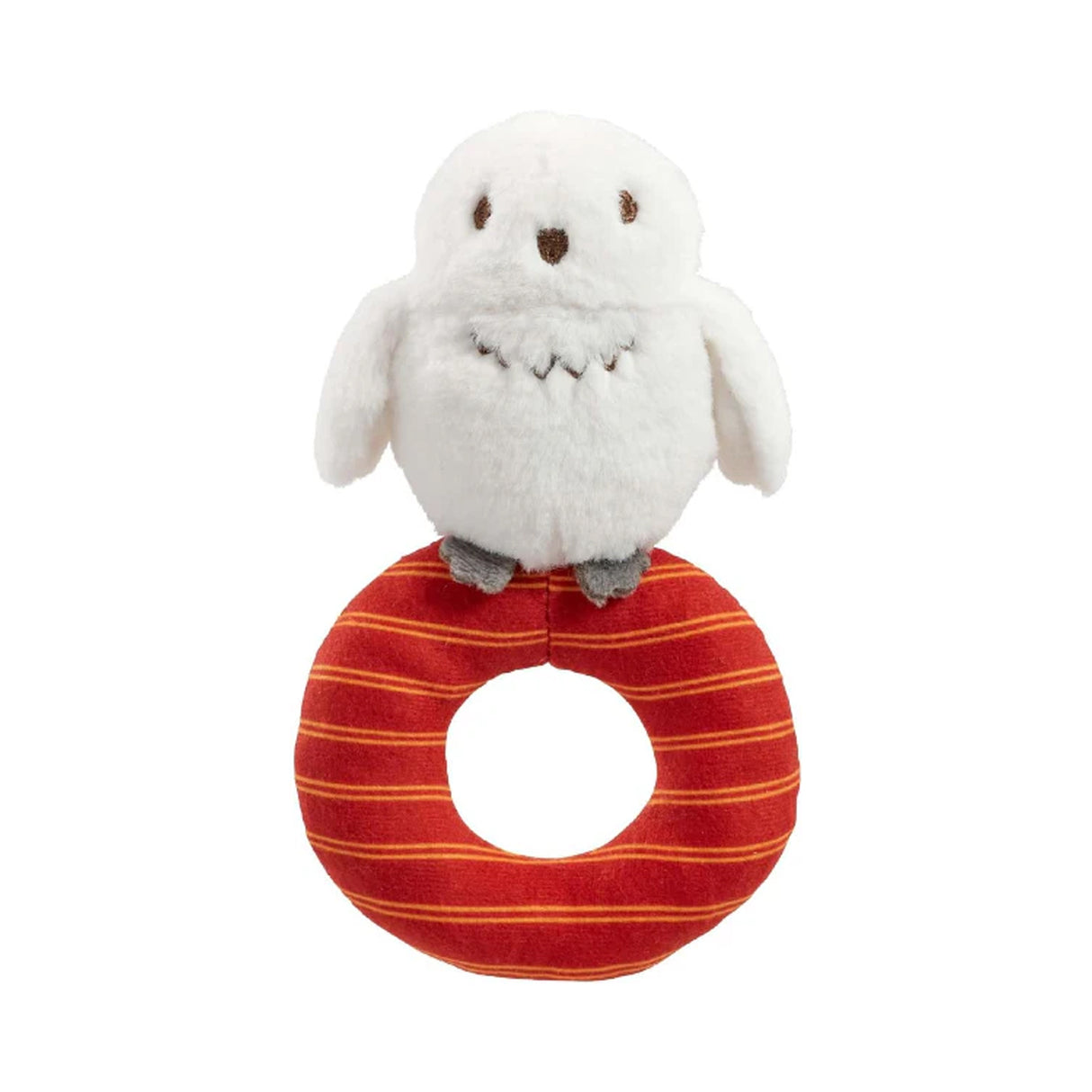 A plush Harry Potter Hedwig baby ring rattle rattle with a white owl on top sitting on a red and orange striped ring.