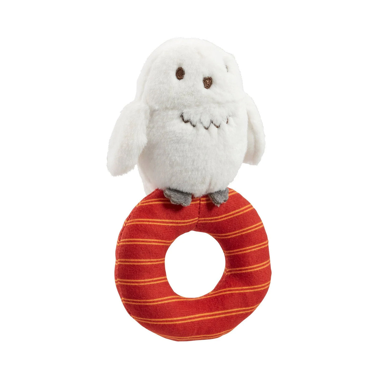 A plush Harry Potter Hedwig baby ring rattle rattle with a white owl on top sitting on a red and orange striped ring.