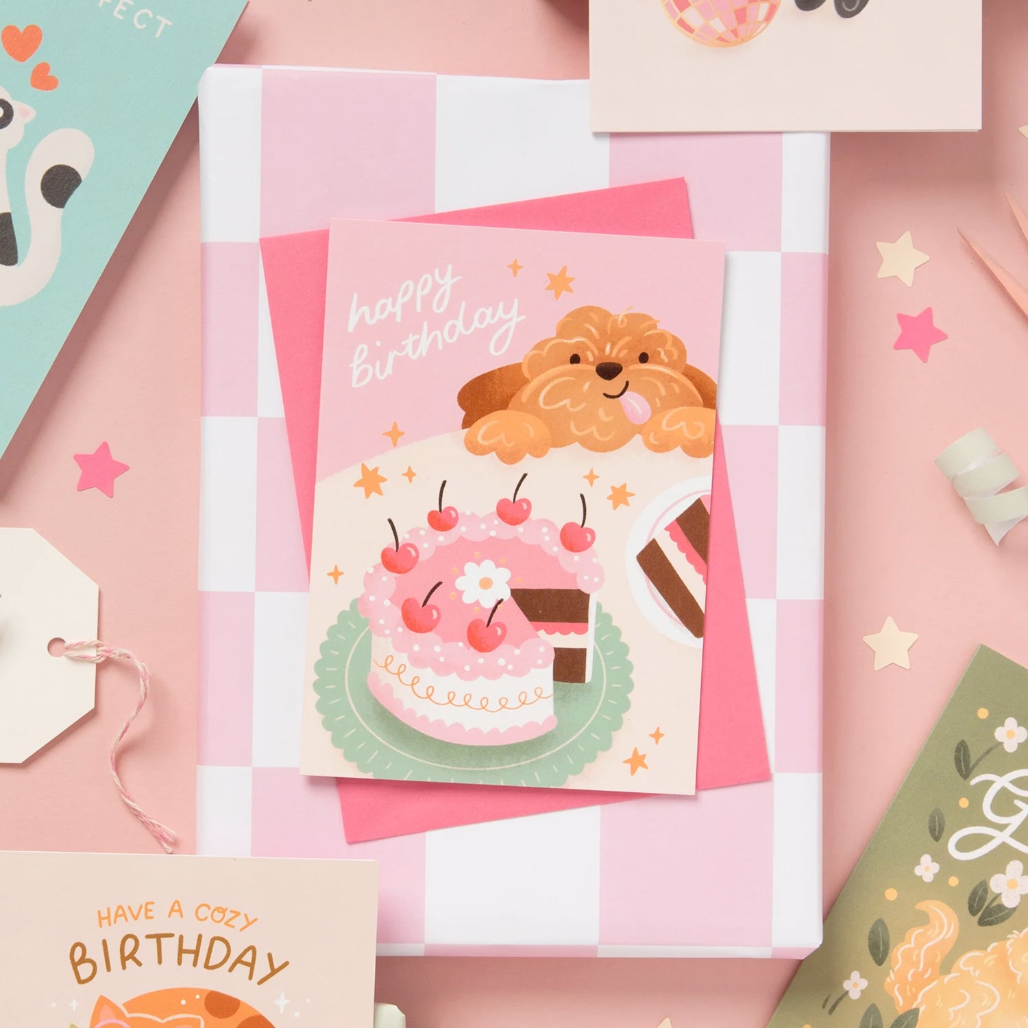 Collection of birthday cards with cute illustrations on a pink background