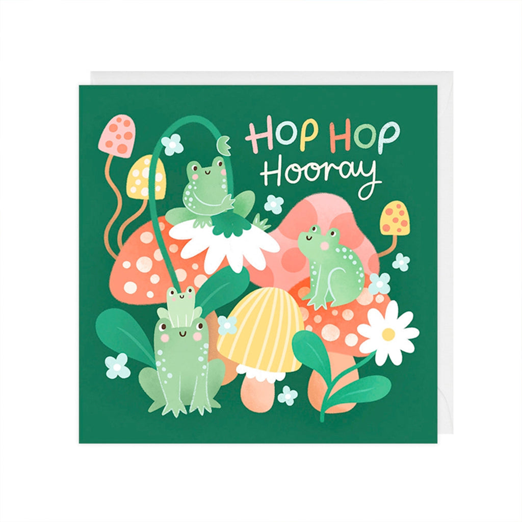 Children's card with frogs, flowers, and mushrooms on a green background