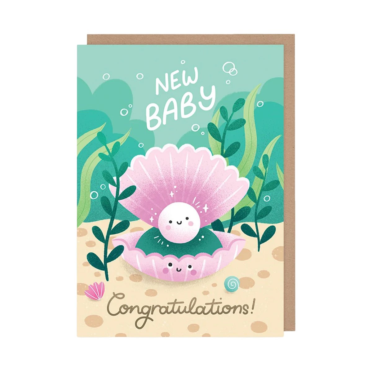 A cute illustrated baby shower card with a kraft envelope behind it. The card shows a smiling pearl in an open pink clam shell underwater, with the words “NEW BABY” at the top and “Congratulations!” at the bottom.
