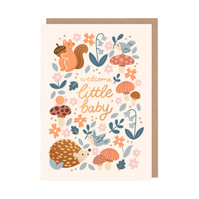 Greeting card with forest-themed illustrations and 'welcome little baby' text on a white background.
