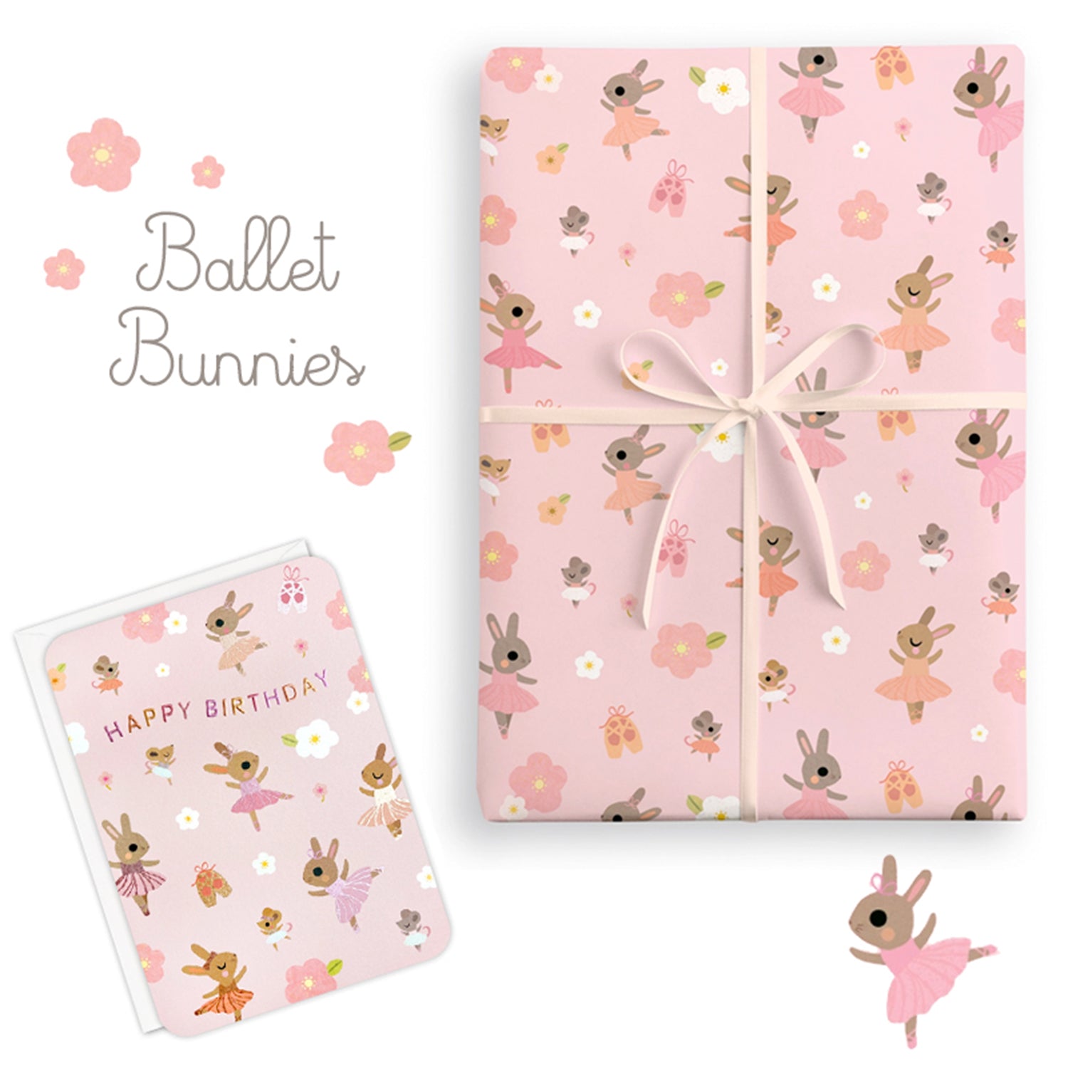 Gift wrap with ballet-themed design featuring bunnies and flowers on a pink background.