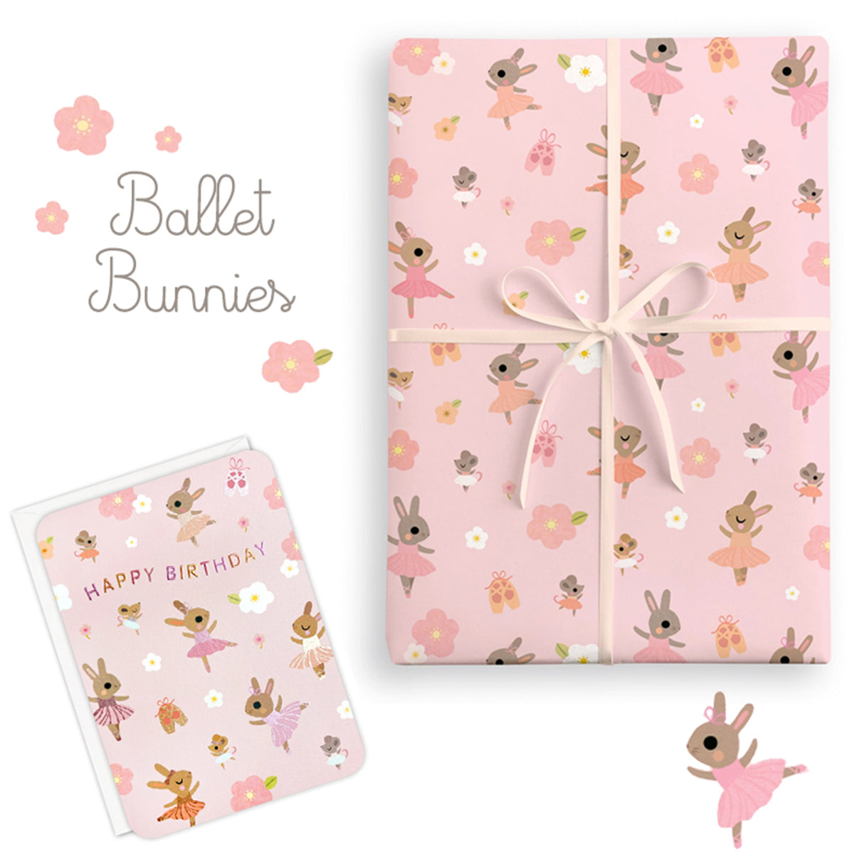 Gift wrap with ballet-themed design featuring bunnies and flowers on a pink background.
