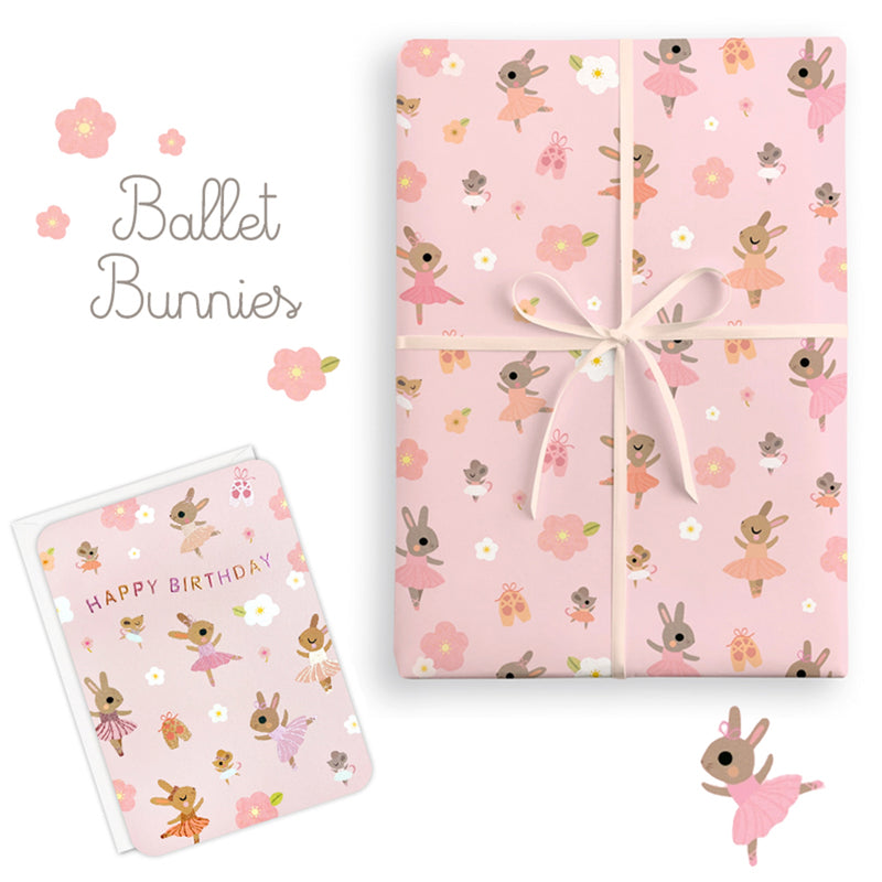 Gift wrap with ballet-themed design featuring bunnies and flowers on a pink background.
