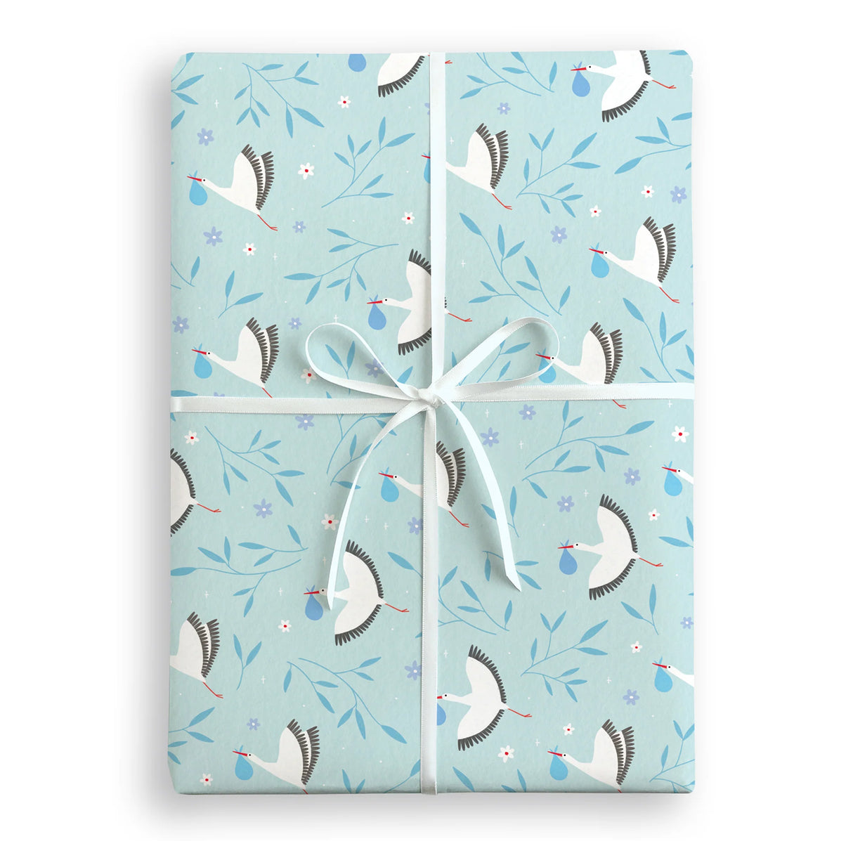 A Patterned blue gift wrap present with white storks holding a blue bundle and blue leaves with purple flowers wrapped with white satin ribbon