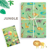 Jungle-themed gift wrap with animals and a birthday card on a white background