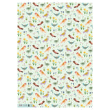 Patterned gift wrap paper with colourful birds and flowers on a light blue background