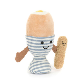 A plush toy resembling an egg with striped patterns and a soft brown and beige 'lance soldier' attached to it, both featuring smiling facial expressions.