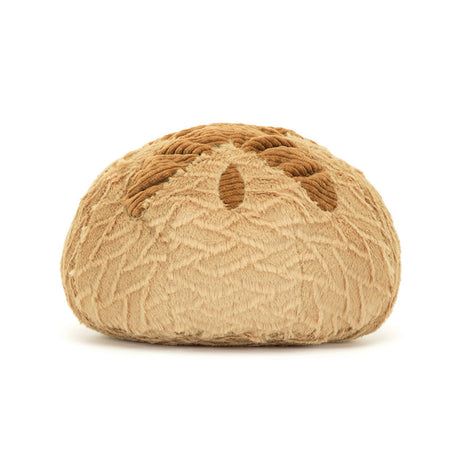 Sourdough Plush toy shaped like a loaf of bread with a smiling face on a white background