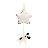 Star-shaped hanging pull toy with a small dog figure on a white background