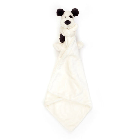 White plush baby toy with black accents on a white background