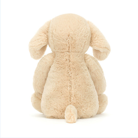 Beige plush bunny toy on a white background