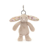 Plush bunny keychain with floral ears on a white background